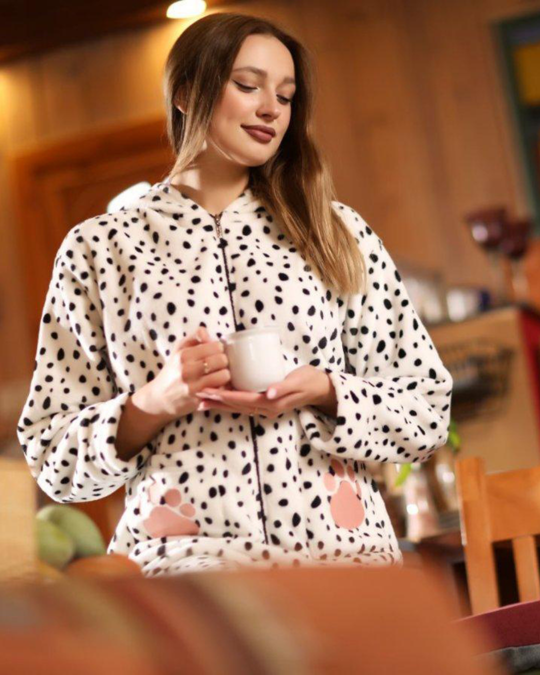Women's jumpsuit dotted with cape