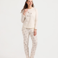Women's pajama set with sleeves and leaf-patterned pants