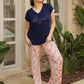 Women's half-sleeved pajamas with lace on the sleeve and floral trousers with a heart on the chest