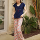 Women's half-sleeved pajamas with lace on the sleeve and floral trousers with a heart on the chest