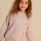 Girls' pajamas in warm colors with a floral print