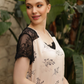 Women's short shirt with half sleeves, lace back, and floral lace