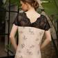 Women's short shirt with half sleeves, lace back, and floral lace