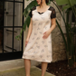 Women's short shirt with half sleeves, lace back, and floral lace
