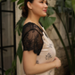 Women's short shirt with half sleeves, lace back, and floral lace