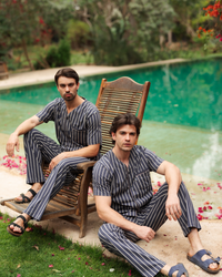 Men's pajamas open with a lot of text and printed trousers