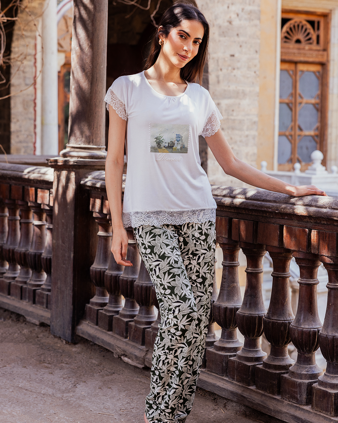Women's pajamas with a half-sleeved top and a lace print and olive-rose trousers