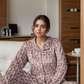 Women's pajamas with patterned buttons