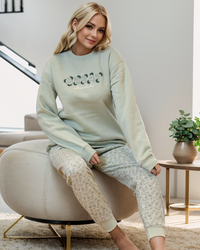 GREAT Women's Pajamas T-shirt with printed sleeves on the chest and patterned pants