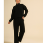 Enjoy winter outings in a soft women's set in dark colors