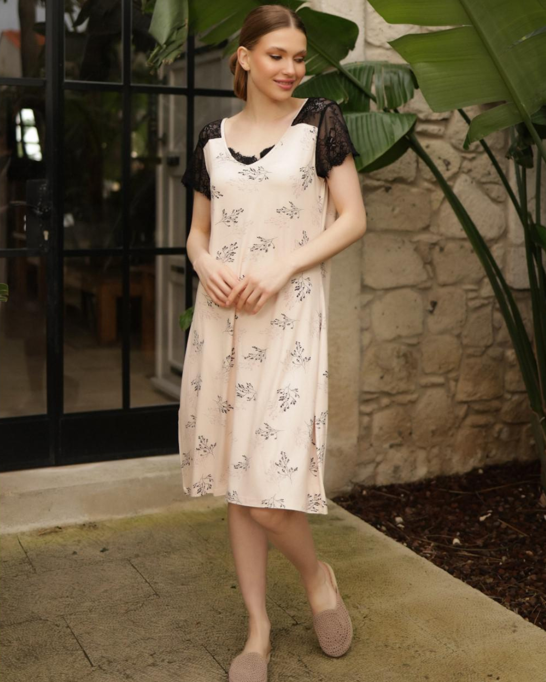 Women's short shirt with half sleeves, lace back, and floral lace