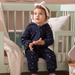 Shine Stars Baby girls zip-up jumpsuit with a fur-lined cabochon