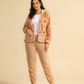 Enjoy Warmth in a fuzzy beige pajama