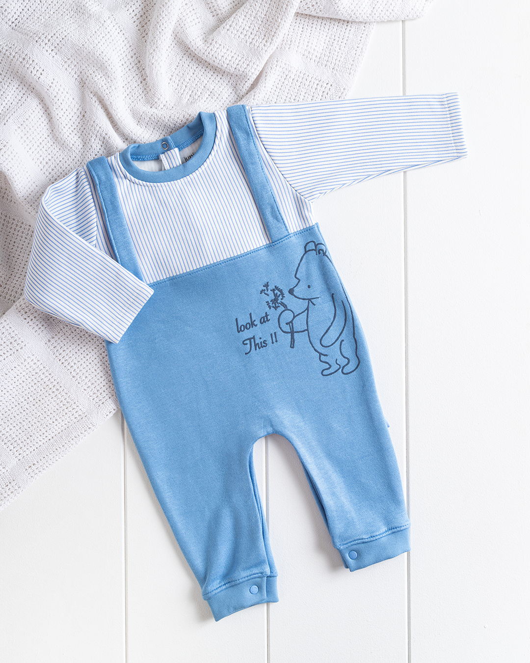 Baby boy's jumpsuit with a printed strap