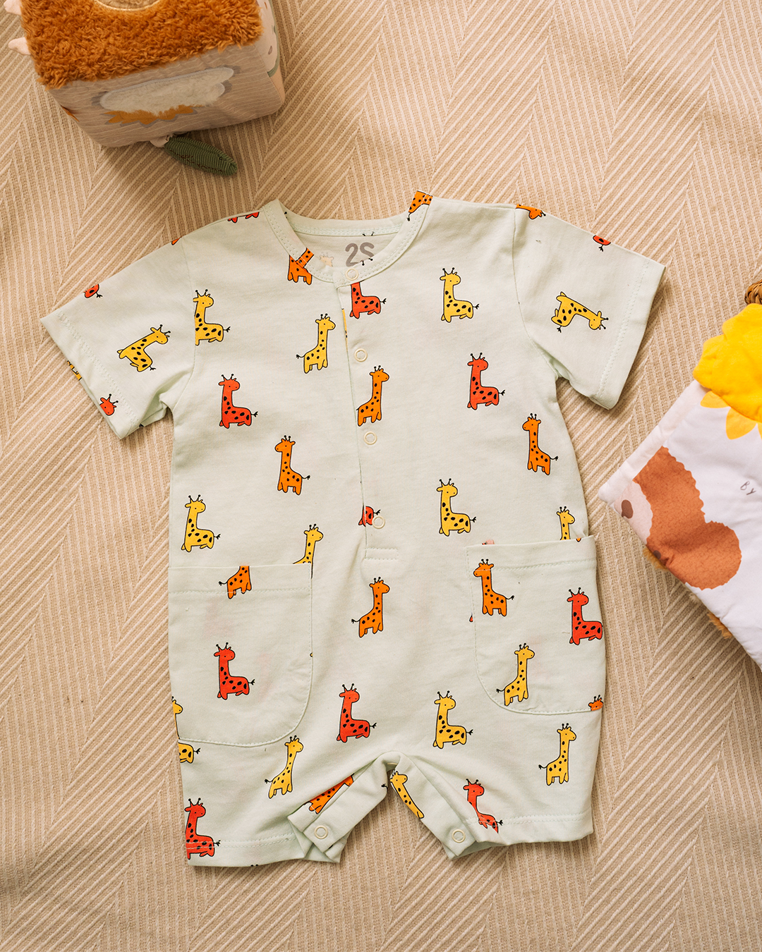 Children's romper with a cute giraffe print