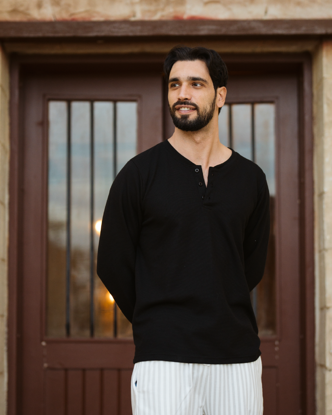 Striped men's pajamas with sleeves and buttons