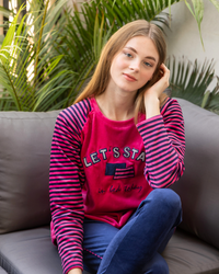 Women's velor pajamas with striped sleeves