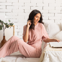 Women's pajamas, half sleeves, with buttons and trousers