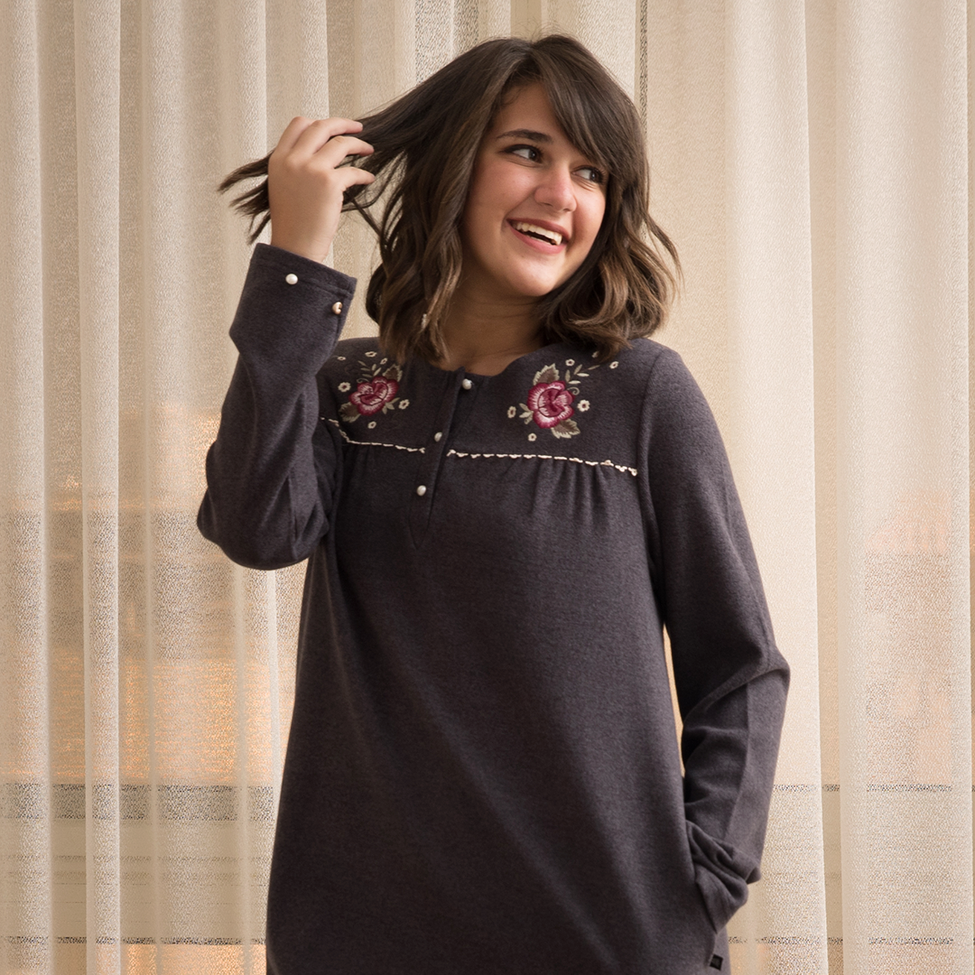 A cashmere shirt with an embroidered rose on the chest 