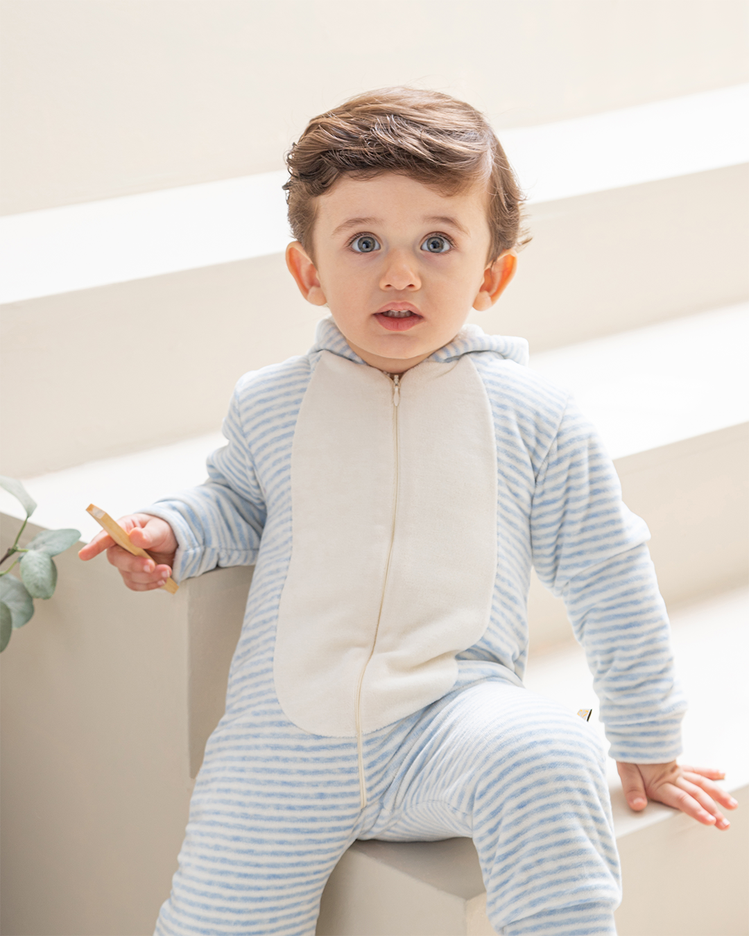 Boy's bodysuit with a velvet stripe lining