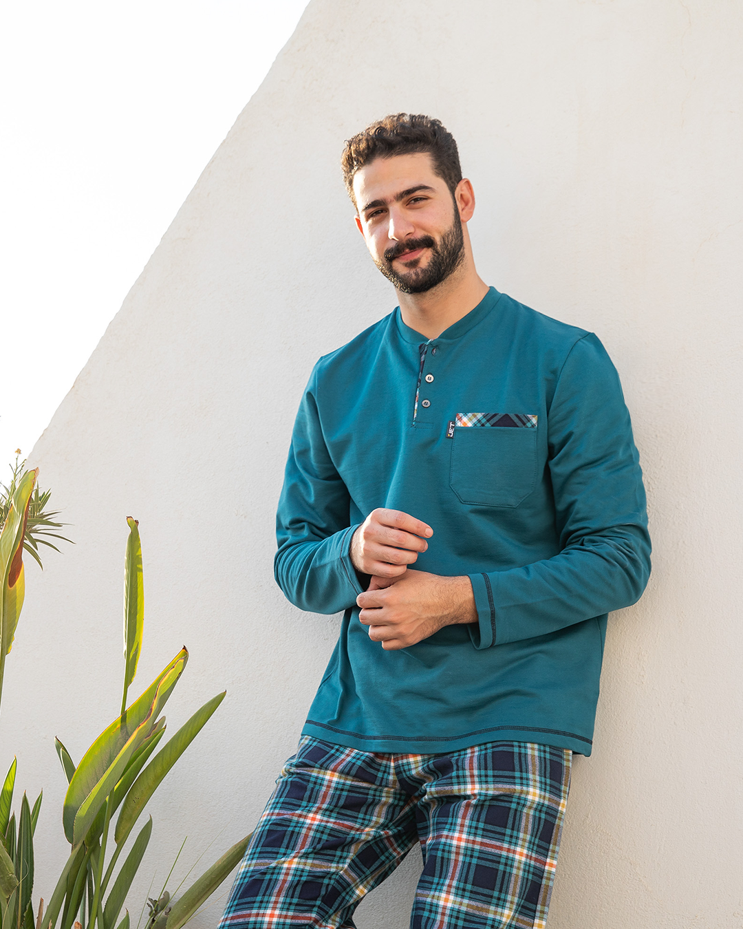 Men's pajamas with a button-up neck and checkered pants