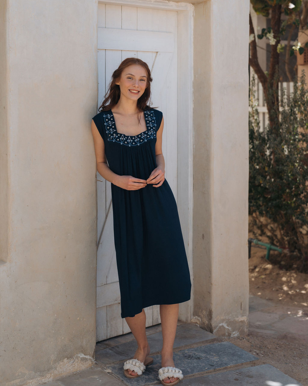 Women's short, plain, ruffled shirt with an embroidered cut