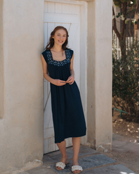 Women's short, plain, ruffled shirt with an embroidered cut