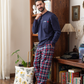 Men's pajamas with a button-up neck and checkered pants