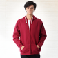 Sweatshirt with a zip and a cabochon